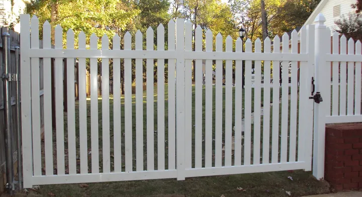 Vinyl gate fencing installed by Allsteel Fence